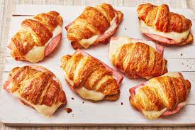 Savory croissant with ham and cheese filling